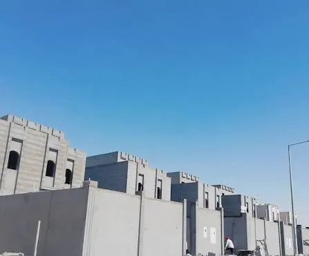 Row of villas at the block work stage