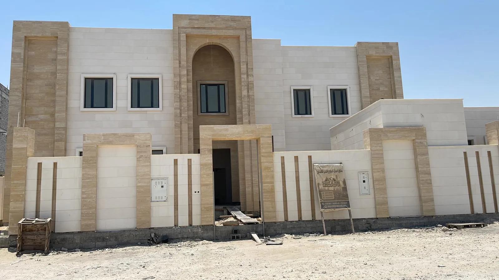 Two-storey villa with a natural stone facade